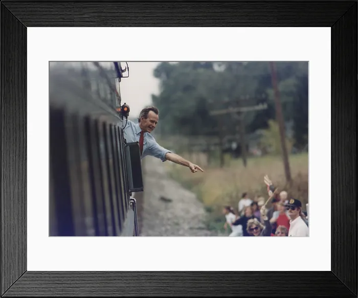 Framed Print : President Bush waves from the back of the train during his re-election campaign in Bowling Green Ohio. Sep. 26 1992. (BSLOC_2011_3_63) Framed Print : President Bush waves from the back of the train during his re-election campaign in Bowling Green Ohio. Sep. 26 1992. (BSLOC_2011_3_63)