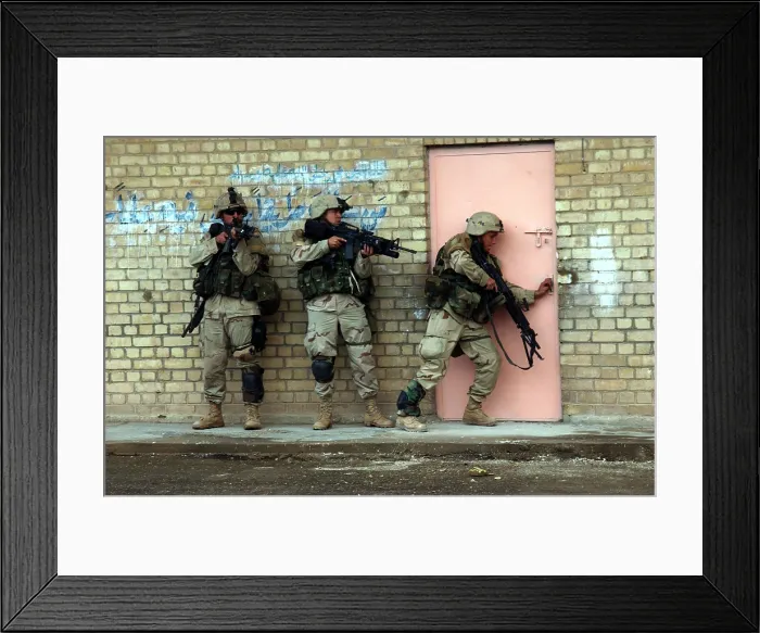 Framed Print : U.S. Army soldiers are poised to enter a building in Fallujah Iraq. Second Gulf War Nov. 9 2004. (BSLOC_2011_3_10)