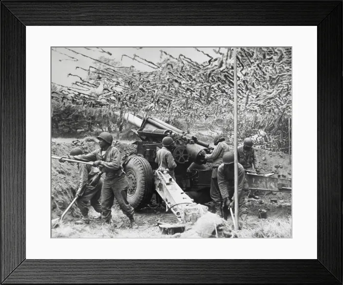 Framed Print : African American soldiers set up a 155mm howitzer field battery in France. They followed the advance of the infantry, June 28, 1944, during World War 2. (BSLOC_2013_14_237)