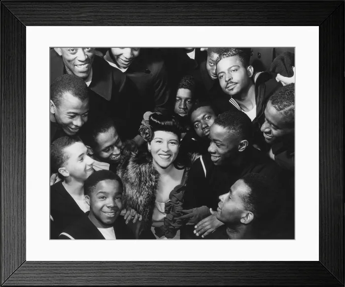 Framed Print : Marva Louis, wife of boxer Joe Louis, entertains African American regiments during World War 2. U.S. Naval Training Station, Great Lakes, Illinois, ca. 1943.. (BSLOC_2013-12_148)