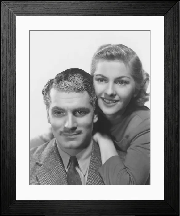 Framed Print : REBECCA, from left: Laurence Olivier, Joan Fontaine, 1940