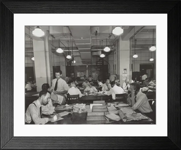 Framed Print : News room of the New York Times, Sept. 3, 1942. In the foreground is the City Desk which handles local news. The City copy desk is in middle ground, with foreign desk to right