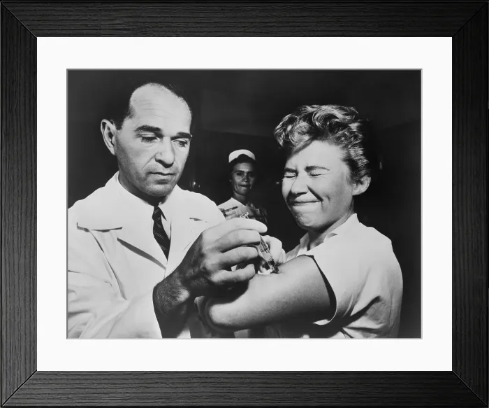 Framed Print : A nurse at Montefiore Hospital receives a flu vaccination in 1957. The 1956-58 Asian Flu was a category 2 flu pandemic that originated in China in early 1956. - (BSLOC_2015_1_191)