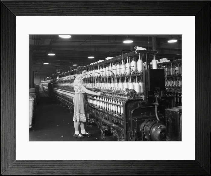 Framed Print : Woman standing at long row of bobbins, at a textile factory. Millville, N.J. 1936. Photo by Lewis Hine. - (BSLOC_2015_1_172)
