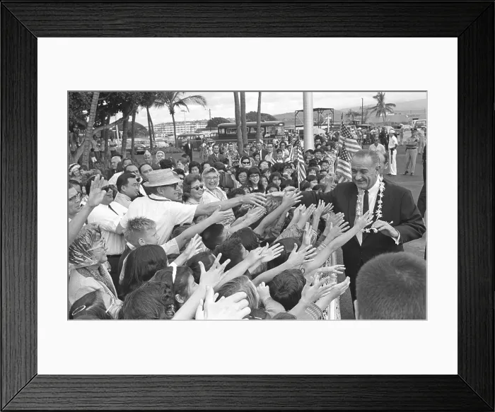Framed Print : President Lyndon Johnson greeted by a friendly crowd at the Honolulu Airport, Hawaii after Honolulu Conference on the Vietnam War. Feb. 8, 1966