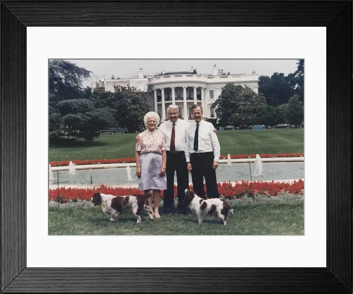 Framed Print : Russian President Boris Yeltsin poses on the South Lawn of the White House with President George and Barbara Bush and their dogs Millie and Ranger. June 12 1992. (BSLOC_2011_3_78)