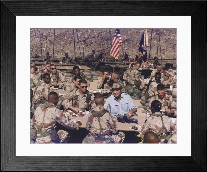 Framed Print : President George Bush having Thanksgiving dinner with U.S. troops in Saudi Arabia. Nov. 22 1990. (BSLOC_2011_3_81)