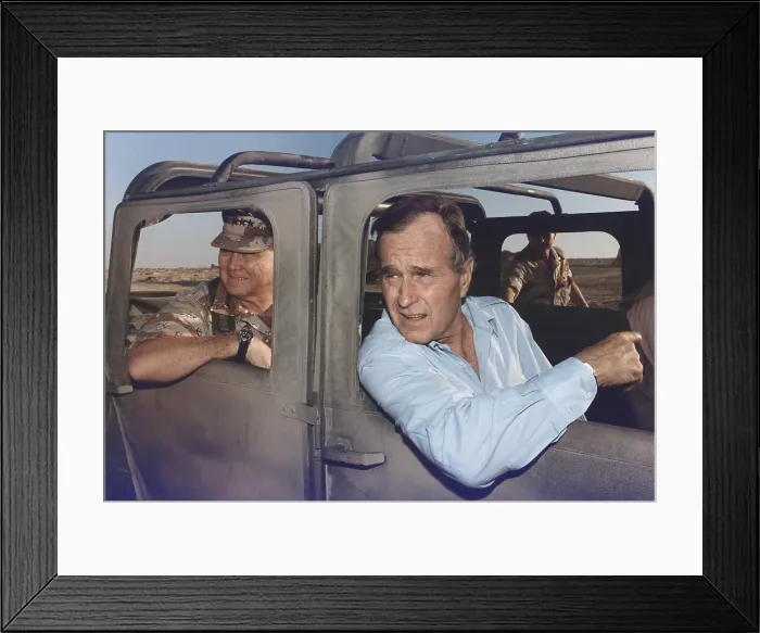Framed Print : President George Bush riding in an armored jeep with General Schwarzkopf in Saudi Arabia. Nov. 22 1990. (BSLOC_2011_3_82)