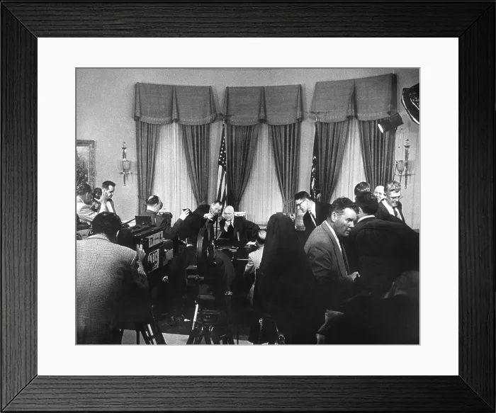 Framed Print : President Eisenhower and newsmen before a Radio-TV address discussing his health after his Sept. 1955 heart attack. He announced he would run for a second term in the presidency