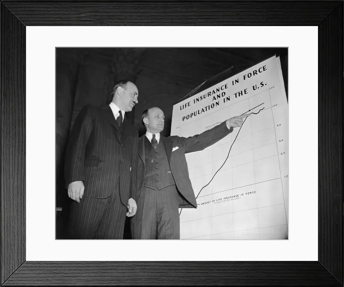 Framed Print : Ernest How and Dr. Donald H. Davenport witnesses to the temporary National Economic Committee Monopoly Committee with a chart to be used in the investigation