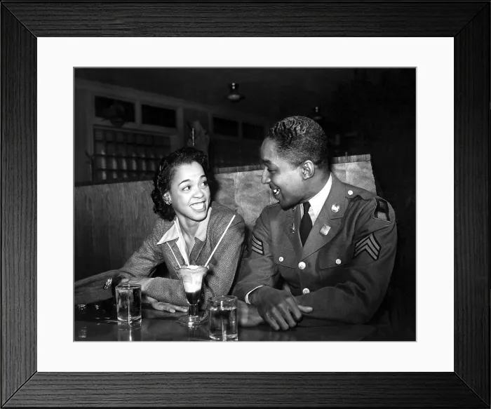 Framed Print : Sgt. Franklin Williams, on leave from army duty, with his best girl Ellen Hardin, splitting a soda. May 1942, during World War 2. (BSLOC_2013_14_251) Framed Print : Sgt. Franklin Williams, on leave from army duty, with his best girl Ellen Hardin, splitting a soda. May 1942, during World War 2. (BSLOC_2013_14_251)