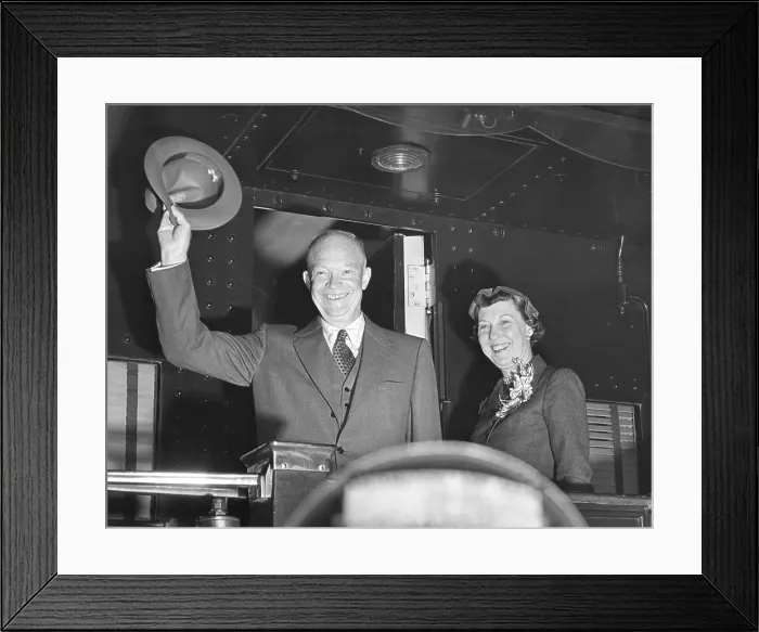 Framed Print : President Eisenhower and wife Mamie wave from the back of a train. Nov. 14, 1953. They were departing for a three day trip to Canada. - (BSLOC_2014_16_77) Framed Print : President Eisenhower and wife Mamie wave from the back of a train. Nov. 14, 1953. They were departing for a three day trip to Canada. - (BSLOC_2014_16_77)