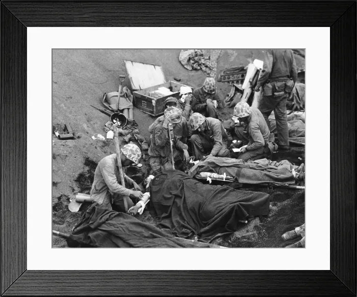 Framed Print : Navy doctors and corpsmen treat seriously wounded Marines on Iwo Jima. Feb. 19-March 26, 1945, during World War 2. (BSLOC_2013_14_255)