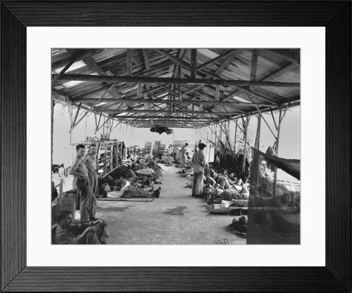Framed Print : U.S. Marines in a hospital on Guadalcanal with wounds and malaria in Oct. 1942. The medical unit was set up in a former Japanese barracks during World War 2. (BSLOC_2013_14_259) Framed Print : U.S. Marines in a hospital on Guadalcanal with wounds and malaria in Oct. 1942. The medical unit was set up in a former Japanese barracks during World War 2. (BSLOC_2013_14_259)