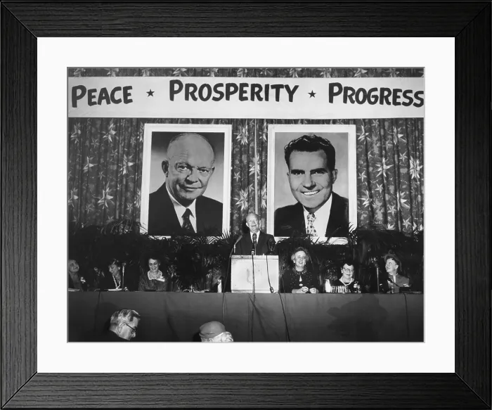 Framed Print : President Eisenhower speaking to Republican Women at the Hotel Statler. March 6, 1956. Large images of the 1956 Republican candidates are displayed at the election year event
