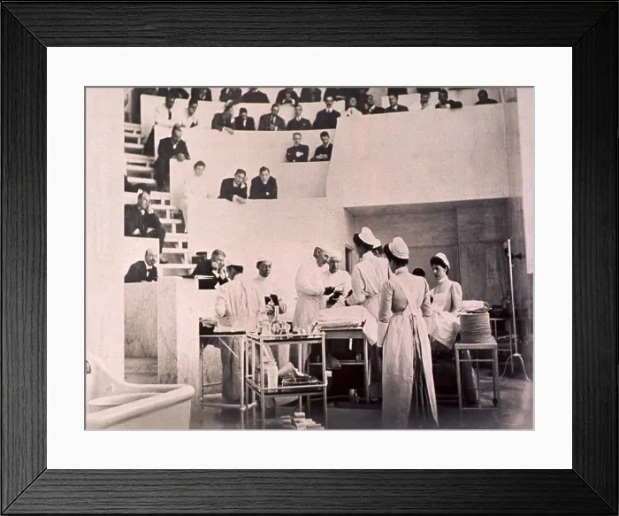 Framed Print : Dr. Harvey Cushing with William Halsted and Hugh Young in the operating theater with an audience of physicians and students, at John Hopkins University, ca. 1910