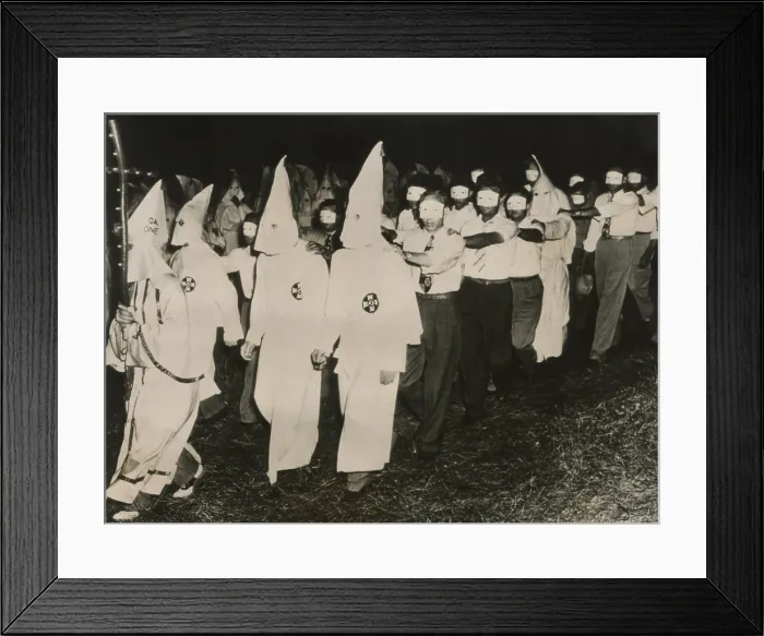 Framed Print : Ku Klux Klan initiation at Stone Mountain near Atlanta, Georgia. June 1949. KKK men in full white masks and gowns lead new members wearing small face masks. - (BSLOC_2015_1_208) Framed Print : Ku Klux Klan initiation at Stone Mountain near Atlanta, Georgia. June 1949. KKK men in full white masks and gowns lead new members wearing small face masks. - (BSLOC_2015_1_208)