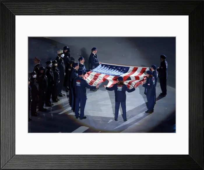 Framed Print : The US Olympic Team holds the American flag that flew over the Ground Zero on Sept. 11, 2001 Framed Print : The US Olympic Team holds the American flag that flew over the Ground Zero on Sept. 11, 2001