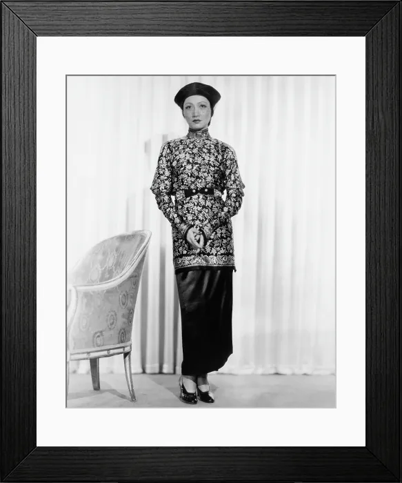Framed Print : LIMEHOUSE BLUES, (aka EAST END CHANT), Anna May Wong, in a printed-silk tunic and satin skirt and turban, 1934 Framed Print : LIMEHOUSE BLUES, (aka EAST END CHANT), Anna May Wong, in a printed-silk tunic and satin skirt and turban, 1934