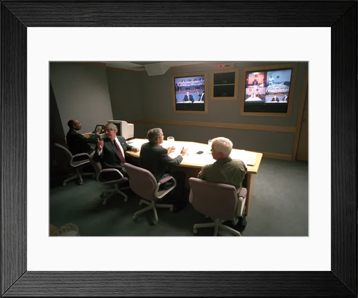 Framed Print : President George W. Bush in a multiscreen video conference at Offutt Air Force Base, Sept. 11, 2001. He met with the National Security Council in a teleconference via the U.S