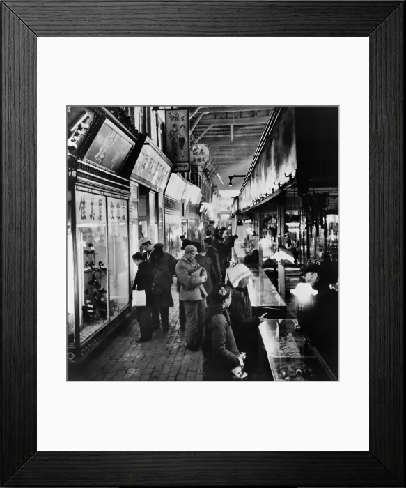Framed Print : Chinese shoppers eye consumer goods at counters and display windows at the Tung An Bazaar in Beijing China. 1964. (BSLOC_2010_18_100)