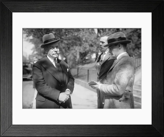 Framed Print : Jules Bache 1861-1944 a German-American stockbroker and banker being interviewed by reporters in Washington D.C. Oct. 22 1922. (BSLOC_2010_18_117)