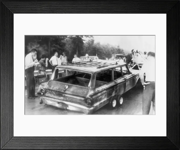 Framed Print : Charred remains of station wagon driven by missing civil rights workers, James Chaney, Michael Schwerner, and Andrew Goodman was found in June 1964