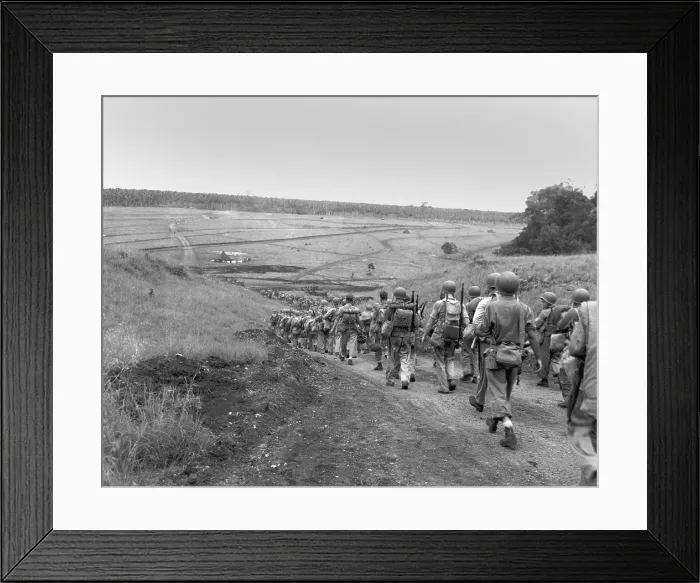 Framed Print : U.S. Marines tired and weary from continuous fighting, march to the U.S. held valley on Guadalcanal. Jan. 1943, during World War 2. (BSLOC_2013_14_31) Framed Print : U.S. Marines tired and weary from continuous fighting, march to the U.S. held valley on Guadalcanal. Jan. 1943, during World War 2. (BSLOC_2013_14_31)