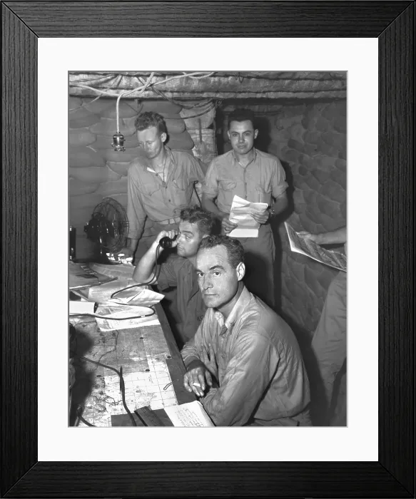 Framed Print : U.S. Marines officers in operational dugout on Guadalcanal. Seated are Lt. Colonel Merrill B. Twining (closest to camera), and Lt. Colonel Henry W. Buse. 1942, during World War 2 Framed Print : U.S. Marines officers in operational dugout on Guadalcanal. Seated are Lt. Colonel Merrill B. Twining (closest to camera), and Lt. Colonel Henry W. Buse. 1942, during World War 2