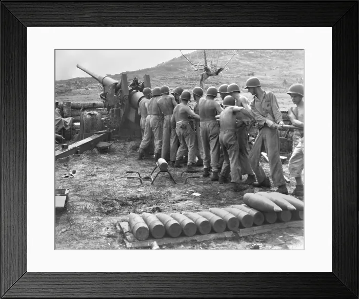 Framed Print : U.S. Marines cleaning artillery on Guam Island. Gunners swab the bore of their gun during a lull in fighting against the Japanese. July-Aug. 1944, World War 2. (BSLOC_2013_14_44) Framed Print : U.S. Marines cleaning artillery on Guam Island. Gunners swab the bore of their gun during a lull in fighting against the Japanese. July-Aug. 1944, World War 2. (BSLOC_2013_14_44)