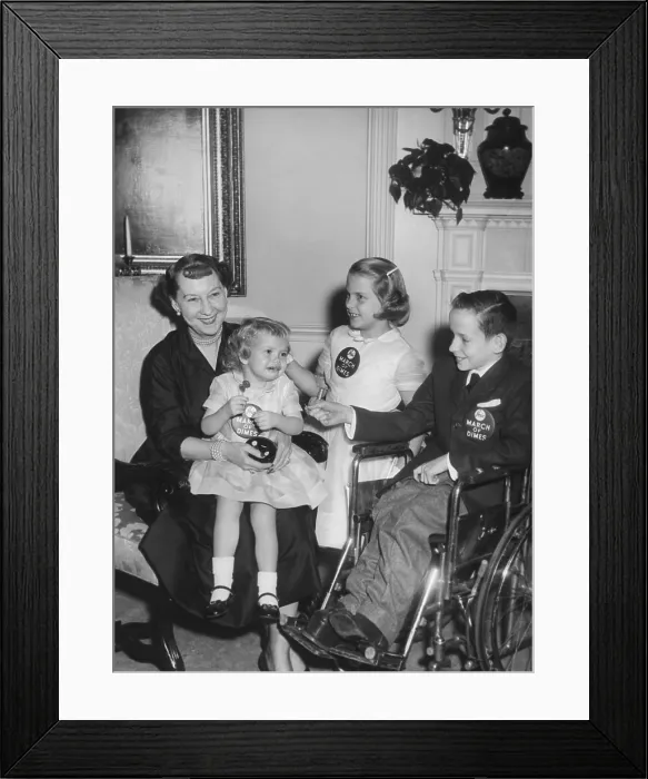Framed Print : Mamie Eisenhower supporting the March of Dimes. Nov. 4, 1958. She poses at the White House with children afflicted by polio. Dec. 20, 1958 - (BSLOC_2014_16_95) Framed Print : Mamie Eisenhower supporting the March of Dimes. Nov. 4, 1958. She poses at the White House with children afflicted by polio. Dec. 20, 1958 - (BSLOC_2014_16_95)