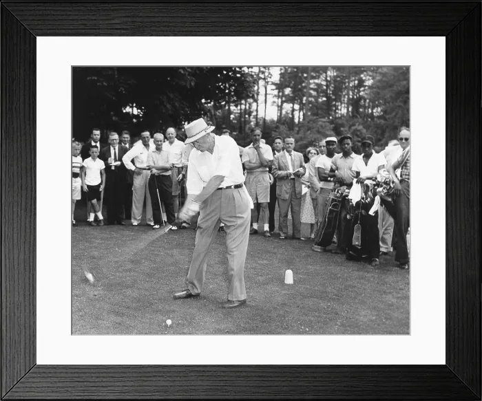 Framed Print : President Dwight Eisenhower teeing off. His audience includes African American caddies. August 1957. - (BSLOC_2014_16_99) Framed Print : President Dwight Eisenhower teeing off. His audience includes African American caddies. August 1957. - (BSLOC_2014_16_99)