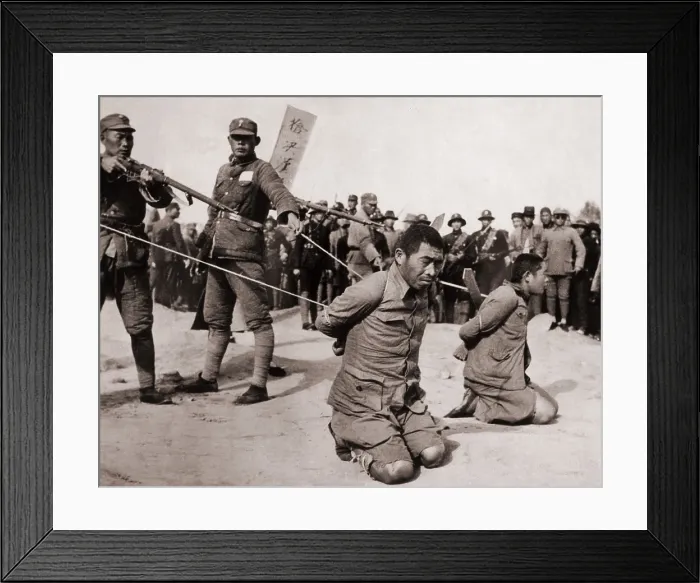 Framed Print : Two Chinese men kneeling prior to execution by Chinese soldiers