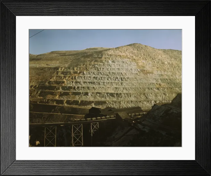 Framed Print : Open-pit mine of the Utah Copper Company, Bingham Canyon, Utah. Photo shows the Carr Fork side of the pit and a railroad bridge dwarfed by the massive scale of the mine