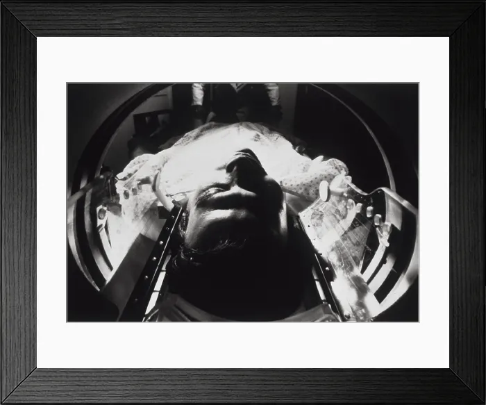 Framed Print : CAT (computer-aided tomography) scan being performed on a patient at the National Institute of Health, Bethesda, Maryland. 1987