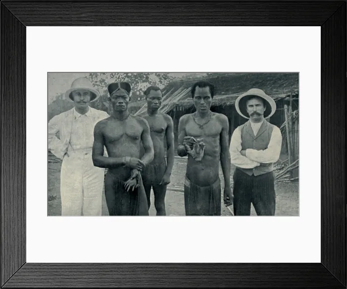 Framed Print : Atrocities of the Rubber Slavery in the Belgian Congo. Natives hold the severed hands of two countrymen murdered by rubber sentries in May 1904