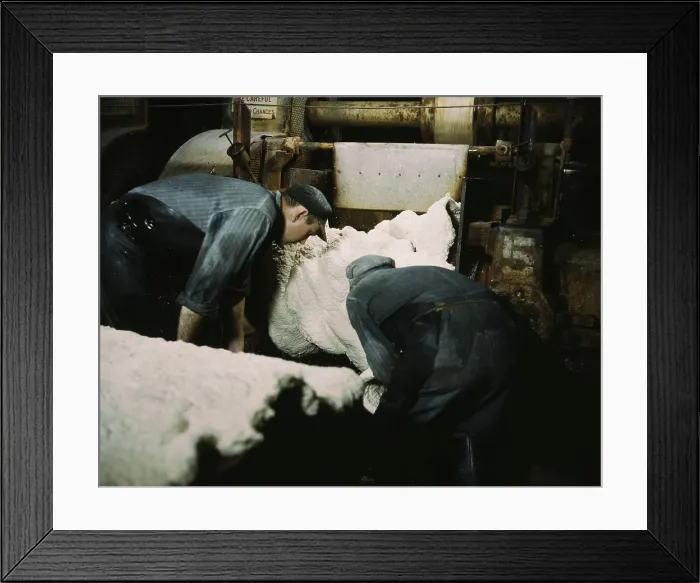 Framed Print : Synthetic rubber coming off the rolling mill in which the crumbs of rubber are squeezed dry of excess water