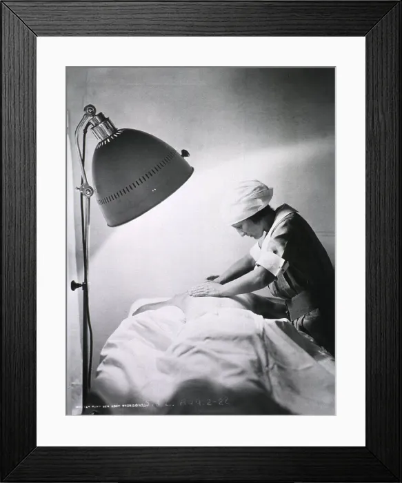 Framed Print : Nurse giving back rub to a patient in Walter Reed General Hospital. 1922