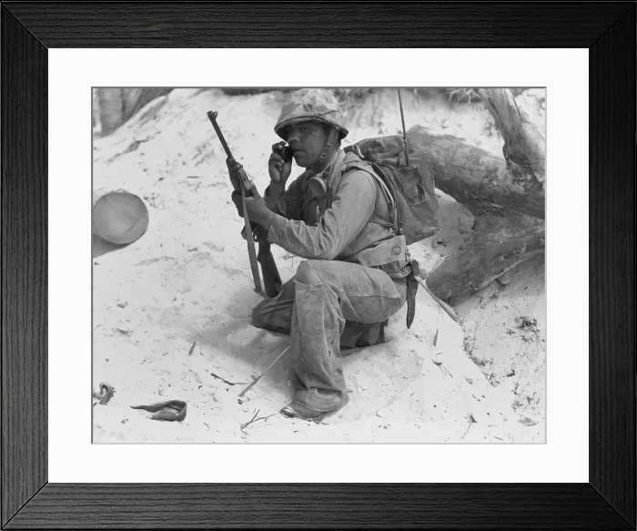 Framed Print : U.S. Marine Native American Code Talker uses walkie-talkie in the South Pacific during World War 2. Nov. 1943. (BSLOC_2013_14_57) Framed Print : U.S. Marine Native American Code Talker uses walkie-talkie in the South Pacific during World War 2. Nov. 1943. (BSLOC_2013_14_57)