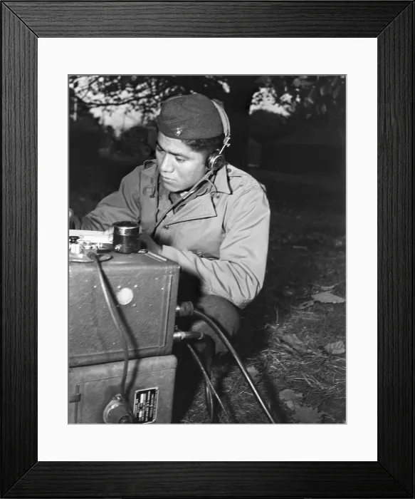 Framed Print : U.S. Marine Corporal Lloyd Oliver, operating a field radio in the South Pacific during World War 2 Framed Print : U.S. Marine Corporal Lloyd Oliver, operating a field radio in the South Pacific during World War 2