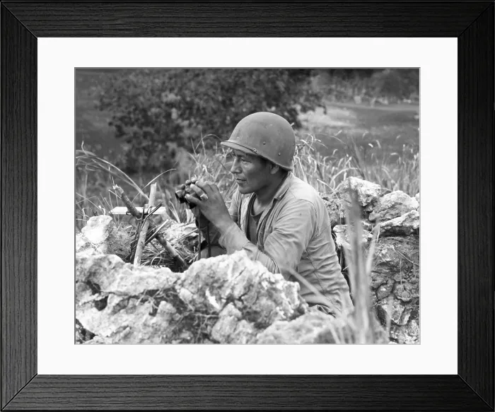Framed Print : Native American Marine Code Talker at an observation post overlooking the city of Garapan. During the Battle of Saipan. June 27, 1944, World War 2. (BSLOC_2013_14_61)
