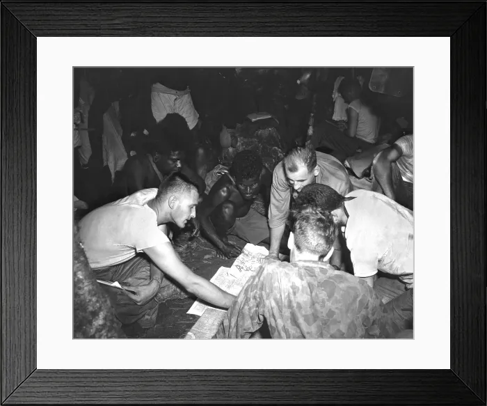 Framed Print : Pacific Island natives report the presence of small Japanese patrols to U.S. Marine Raiders Framed Print : Pacific Island natives report the presence of small Japanese patrols to U.S. Marine Raiders