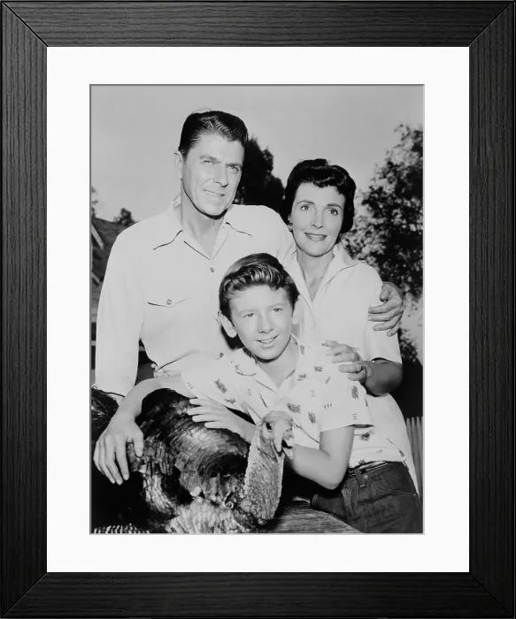 Framed Print : Nancy Davis, Ronald Reagan, Tommy Nolan and a live turkey pose for G.E. Theater publicity photo. 1958. - (BSLOC_2014_17_104)