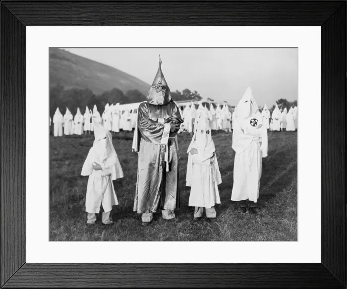 Framed Print : Children in Ku Klux Klan costumes pose with Ku Klux Klan Grand Dragon, Dr. Samuel Green, in Atlanta, Georgia. July 24, 1948 Framed Print : Children in Ku Klux Klan costumes pose with Ku Klux Klan Grand Dragon, Dr. Samuel Green, in Atlanta, Georgia. July 24, 1948