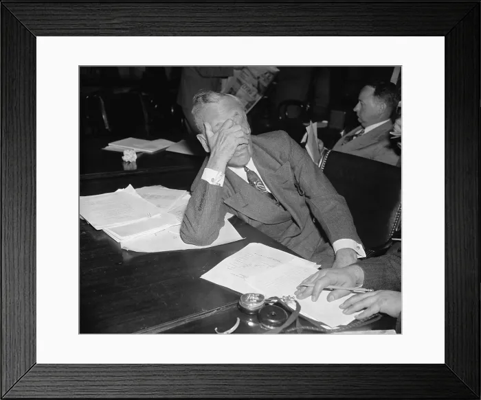 Framed Print : Alfred P. Sloan 1875-1966 chairman of General Motors covered his face with his hand during his testimony before the Congressional Monopoly Committee on May 18 1939