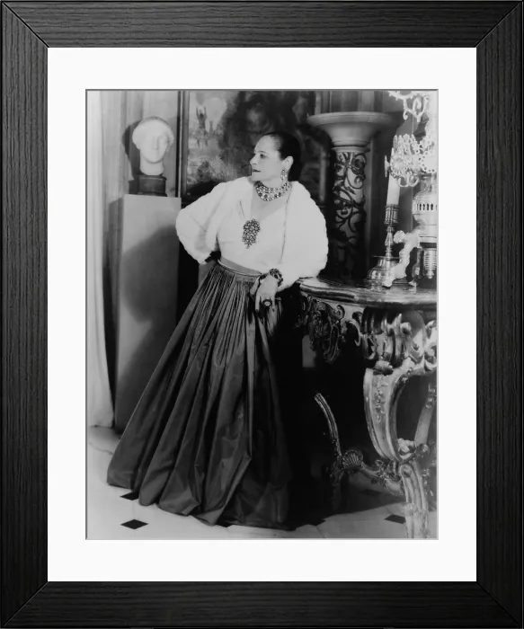 Framed Print : Helena Rubinstein 1870-1965 Polish born cosmetics entrepreneur wearing dramatic jewelry in the dining room of her New York City apartment ca. 1940. (BSLOC_2010_18_153)