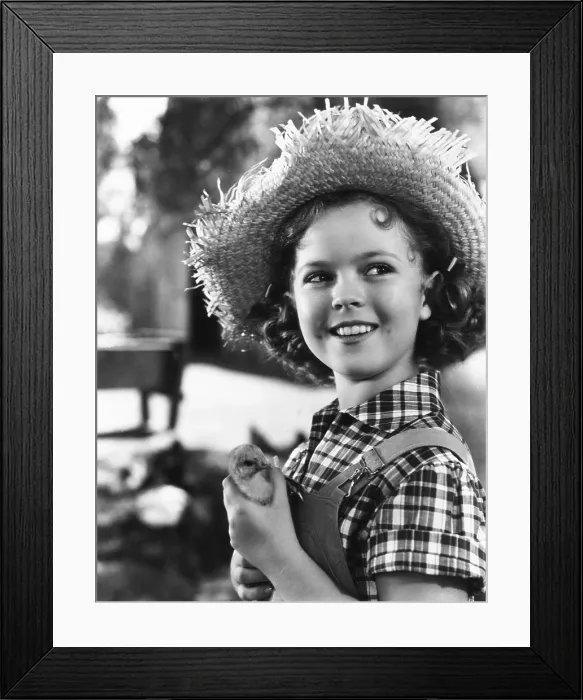 Framed Print : REBECCA OF SUNNYBROOK FARM, Shirley Temple, 1938, 20th Century-Fox Film Corporation, TM & Copyright / courtesy Everett Collection Framed Print : REBECCA OF SUNNYBROOK FARM, Shirley Temple, 1938, 20th Century-Fox Film Corporation, TM & Copyright / courtesy Everett Collection