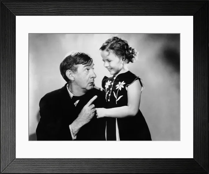 Framed Print : REBECCA OF SUNNYBROOK FARM, from left, Slim Summerville, Shirley Temple, 1938, TM & Copyright 20th Century Fox Film Corp. All rights reserved Framed Print : REBECCA OF SUNNYBROOK FARM, from left, Slim Summerville, Shirley Temple, 1938, TM & Copyright 20th Century Fox Film Corp. All rights reserved