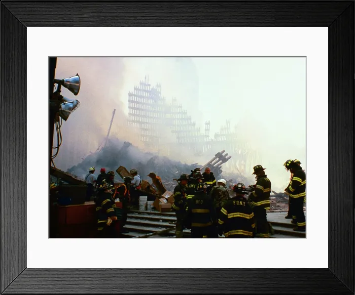 Framed Print : NYC firefighters at Ground Zero two days after 9-11 terrorist attack of on WTC. Behind them is the pile and remaining skeleton of WTC 2, the South Tower Framed Print : NYC firefighters at Ground Zero two days after 9-11 terrorist attack of on WTC. Behind them is the pile and remaining skeleton of WTC 2, the South Tower