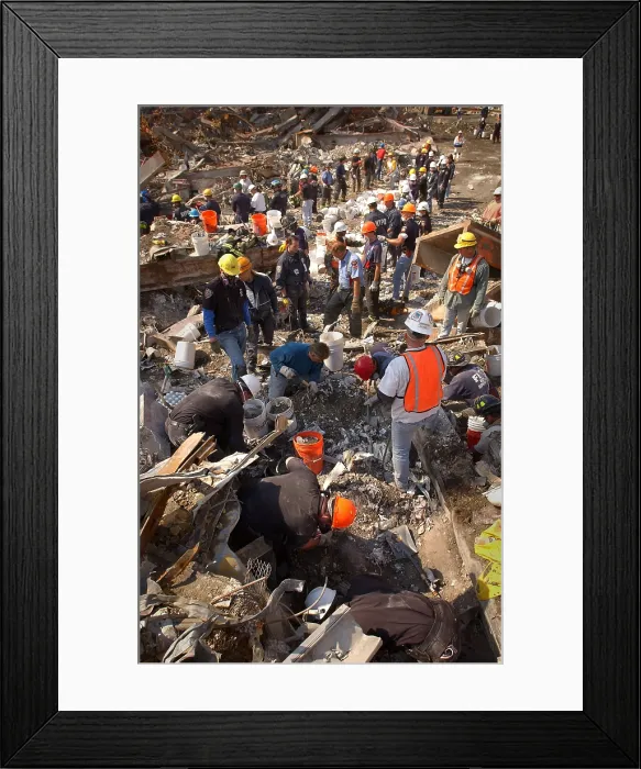 Framed Print : Rescue workers clear the rubble of the World Trade Center one bucket at a time. Sept. 15, 2001. New York City, after September 11, 2001 terrorist attacks. U.S Framed Print : Rescue workers clear the rubble of the World Trade Center one bucket at a time. Sept. 15, 2001. New York City, after September 11, 2001 terrorist attacks. U.S